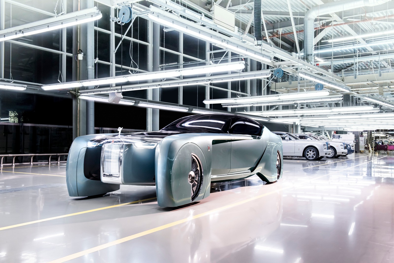 A close up of a car in a factory with a lot of cars (rolls royce, vision next 100, concept cars, electric cars, 2021)