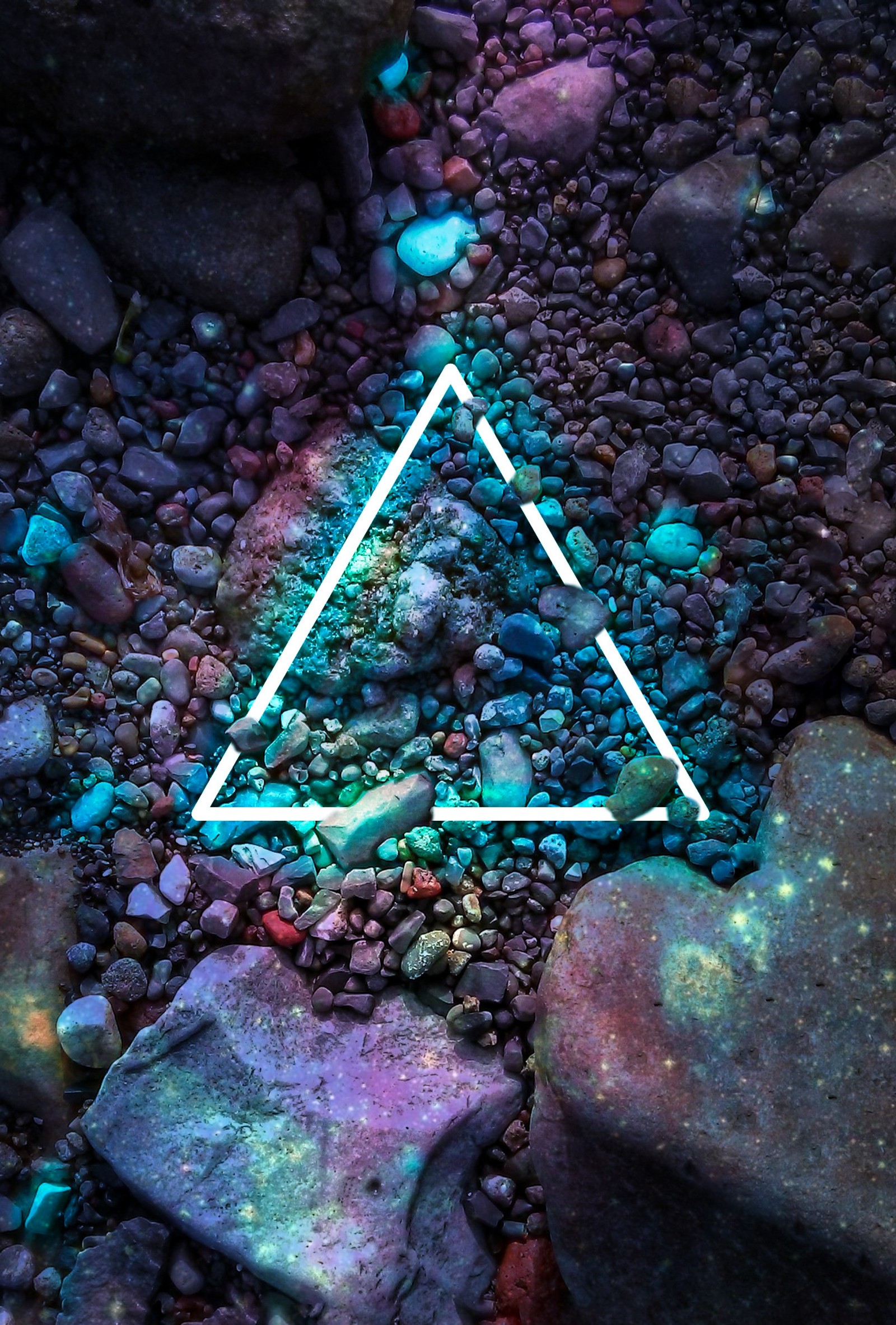 A close up of a triangle on a rocky ground with rocks (anime, black, galaxy, iphone, iphone 11)