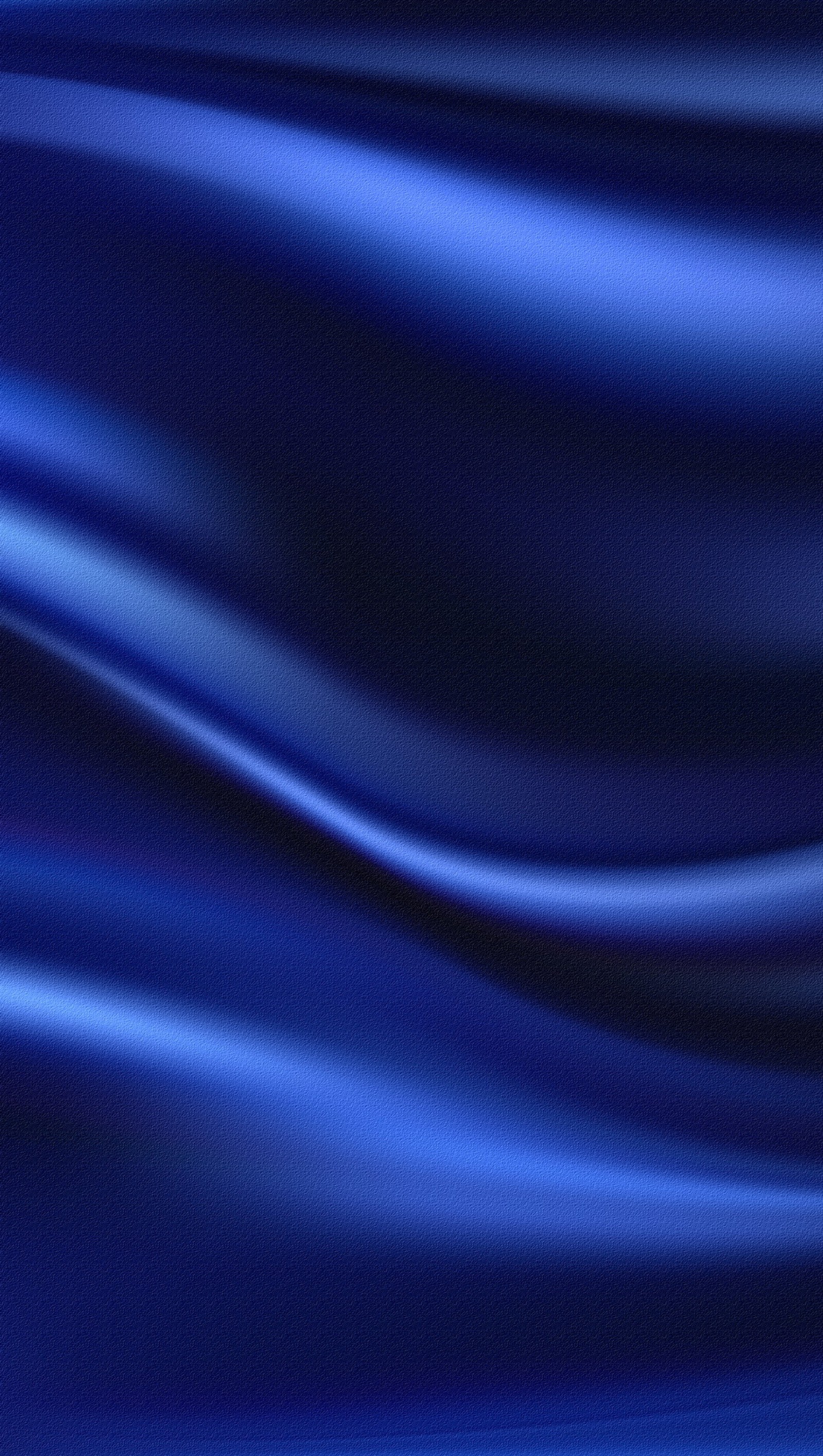 Un primer plano de un fondo de seda azul con una suave ola (abstracto, azul, tela, patrón, seda)