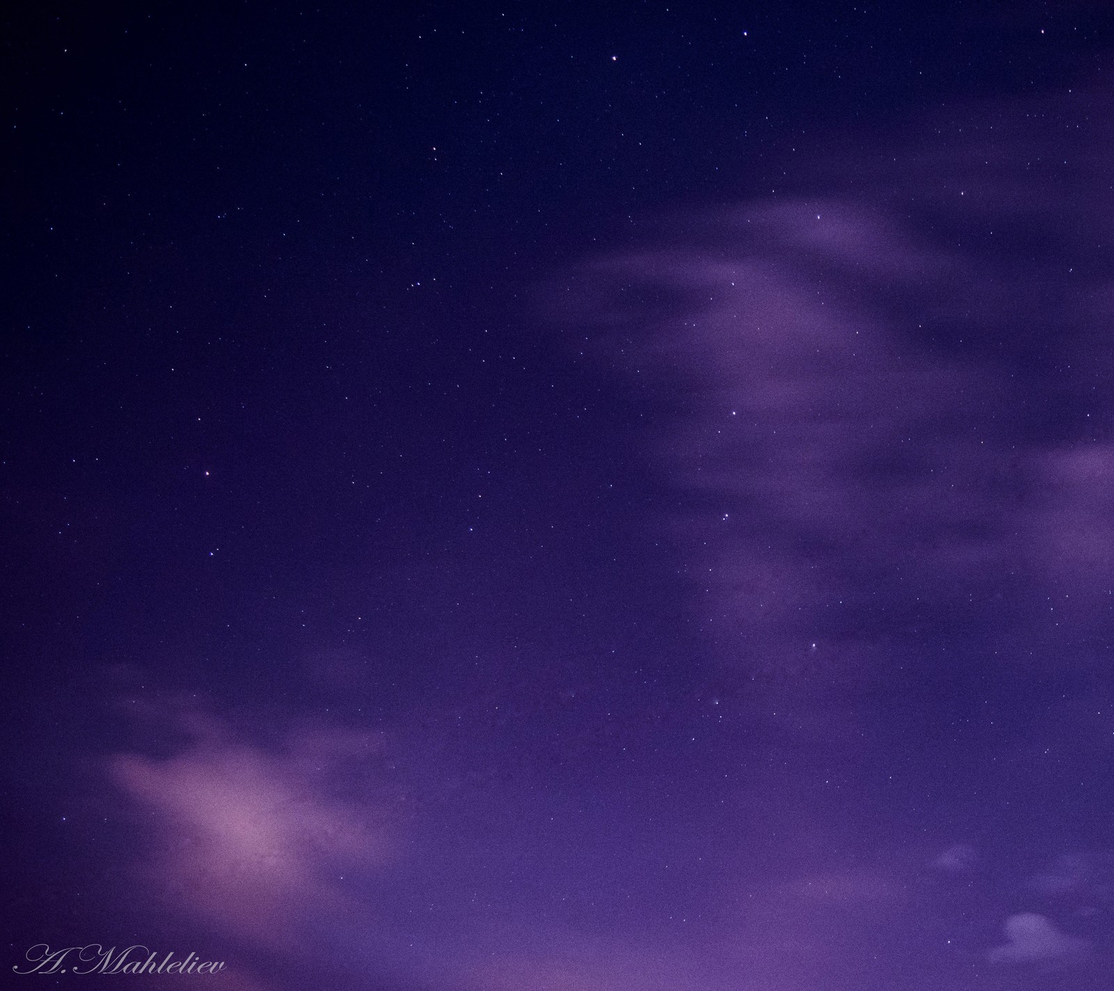 Night sky with clouds and stars and a lighthouse in the foreground (dream, sky)