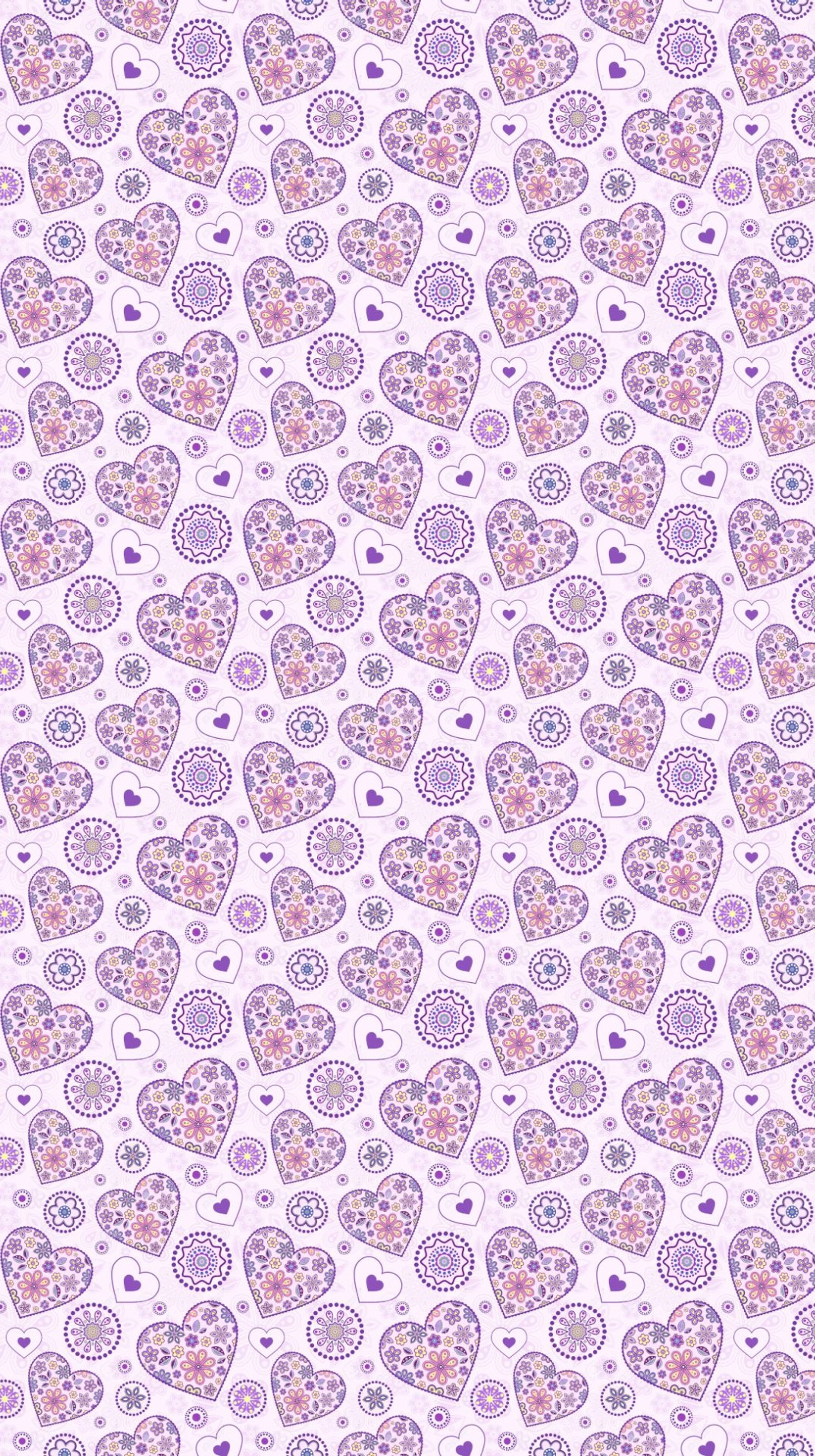 A close up of a pattern of hearts on a white background (hearts, tiny)