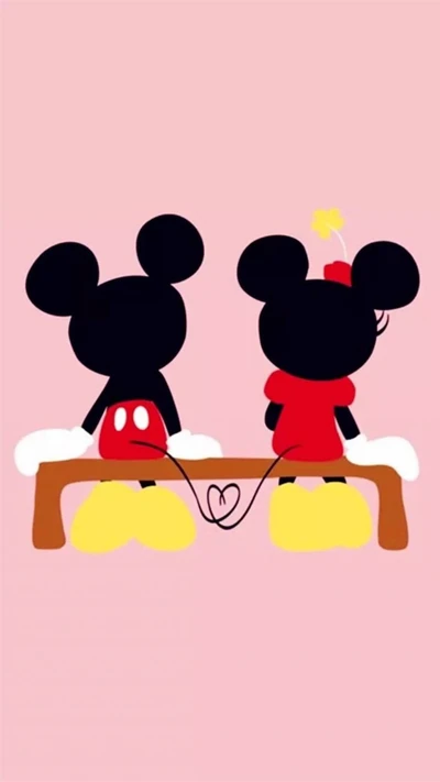 Mickey and Minnie Mouse Sitting Together with a Heart Connection