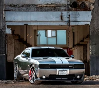 Silver Dodge Challenger SRT: A Bold Muscle Car in Urban Decay