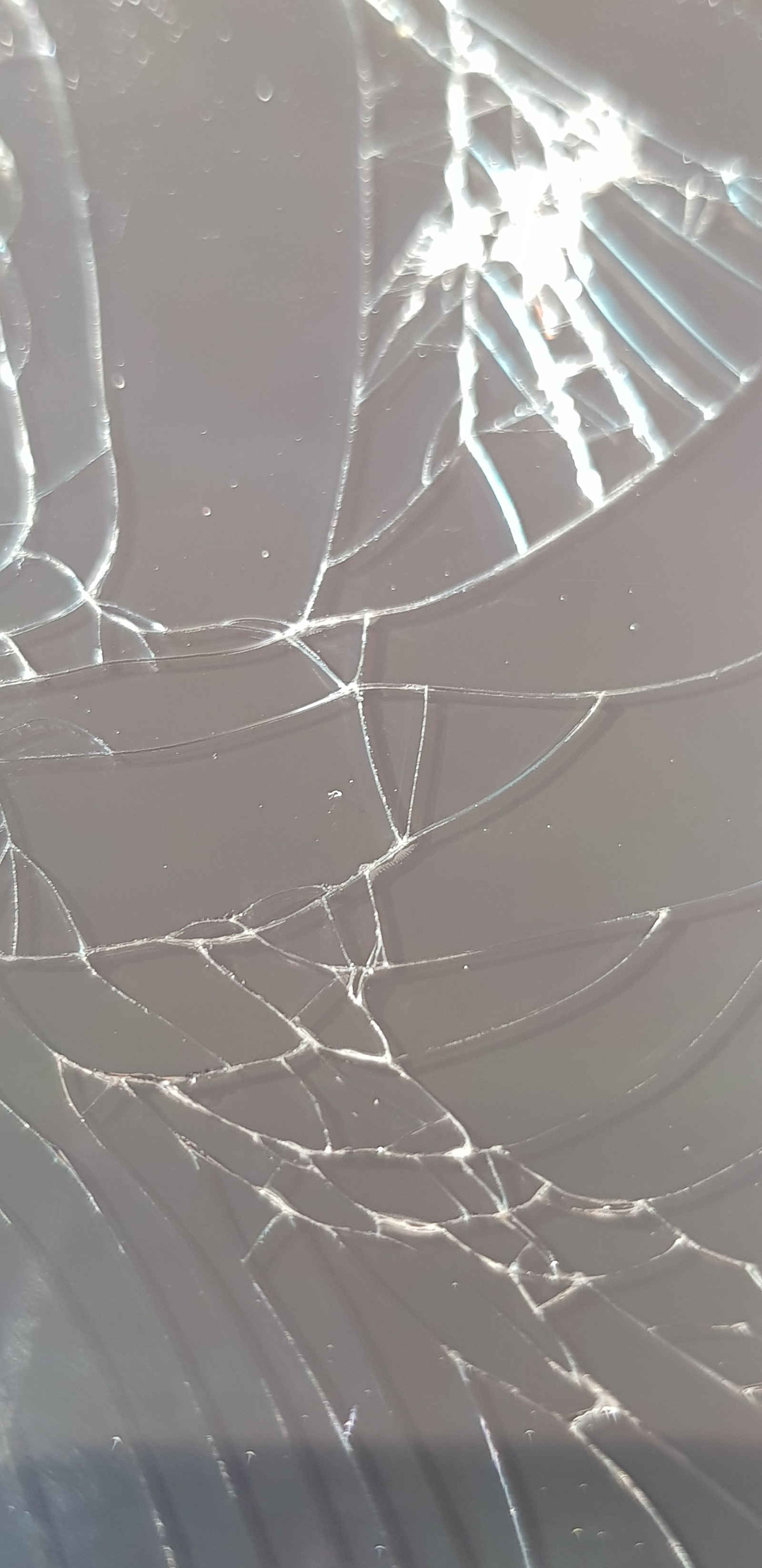 A close up of a broken glass window with a sky background (screen, broken, glass, glas, dream)