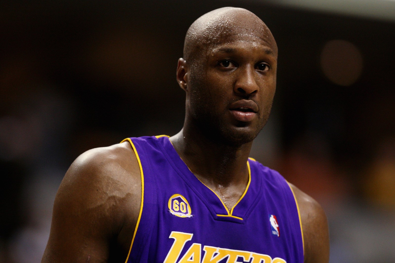 A close up of a basketball player wearing a purple jersey (nba, los angeles lakers, miami heat, los angeles clippers, basketball player)