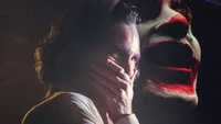 Joaquin Phoenix dans le rôle du Joker : Une transformation hantée de rire et de désespoir