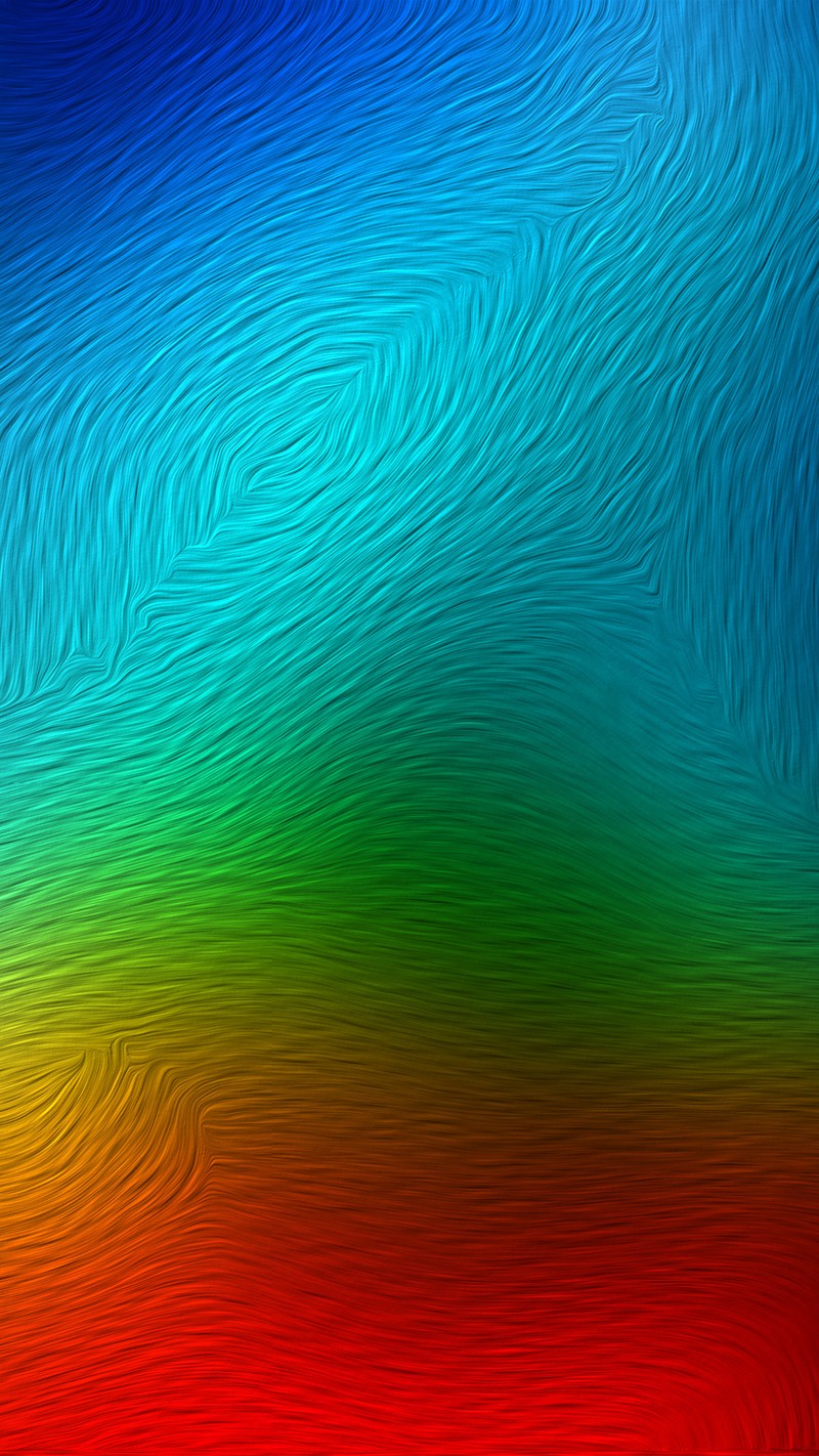 A close up of a colorful background with a wavy design (blue, green, red)