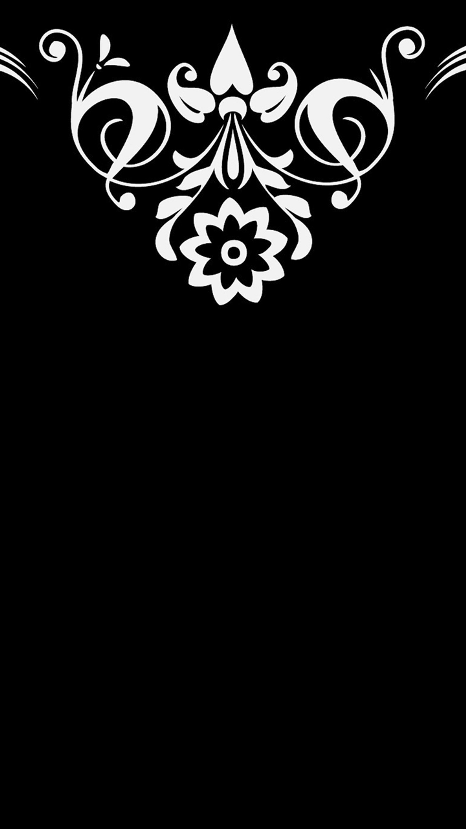 A black and white photo of a decorative design on a black background (abstract, art, black)