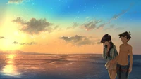 Komi Shouko und Tadano Hitohito bei Sonnenuntergang am Meer