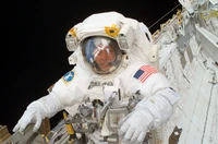 Astronaut in Spacesuit Outside the International Space Station