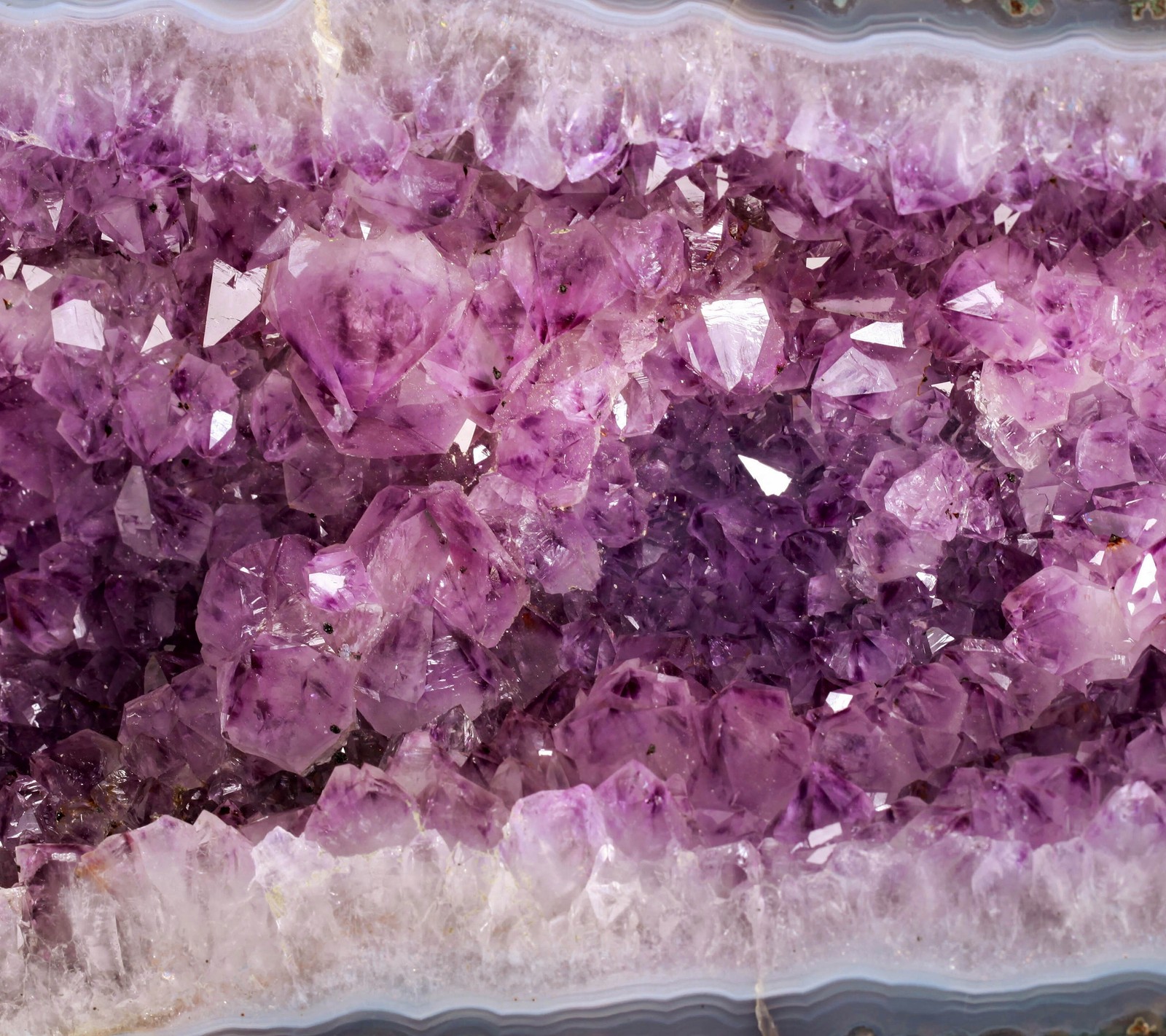 A close up of a purple crystal with a lot of crystals (crystal, gem, rock, stone)