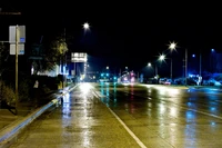 Rainy Night Reflections in an Urban Glasgow Street