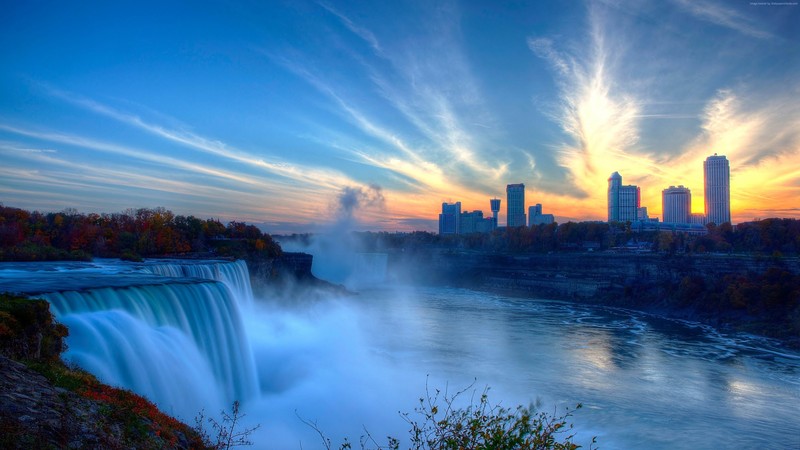 Вид на водопад с городом на заднем плане (ниагарский водопад, niagara falls, водопад, природа, водоем)