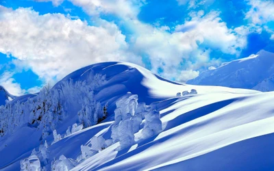 Majestic Snow-Capped Mountain Range Under a Blue Sky