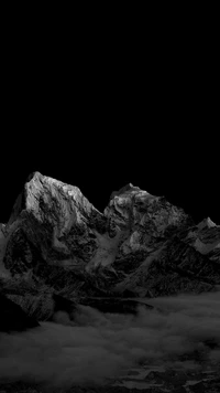 Monochrome Peaks: A Serene Contrast of Light and Darkness