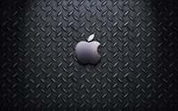 Apple Logo on a Black Metal Diamond Plate Background