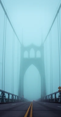 Misty Elegance: A Teal-Toned Suspension Bridge Arching into the Foggy Sky