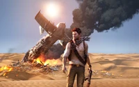 Nathan Drake stands resolutely in a vast desert landscape, with a burning plane wreckage behind him, capturing the essence of adventure and survival in a thrilling action video game.