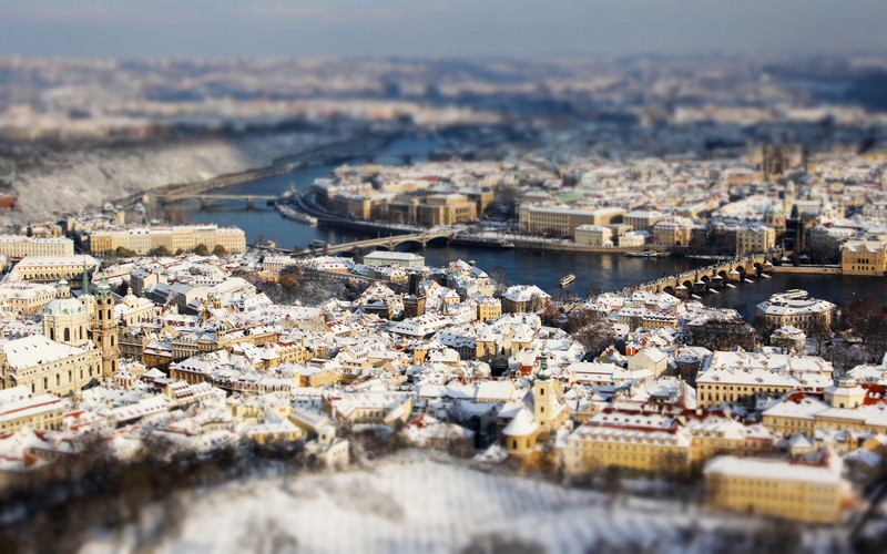 Арафед вид города с рекой и мостом (прага, городская территория, город, городской пейзаж, зима)