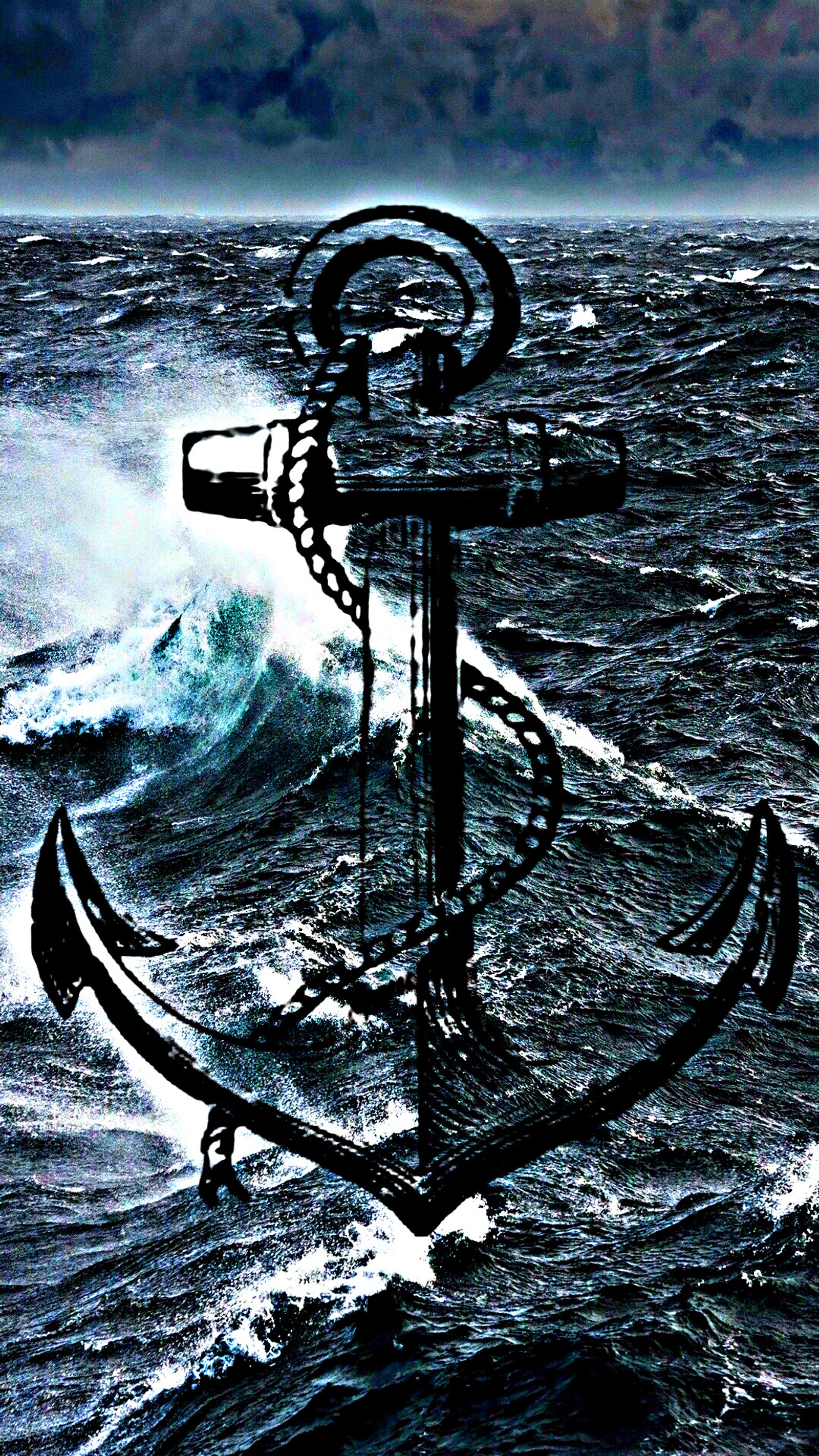 There is a large anchor in the middle of the ocean (anchor, sea, wave)