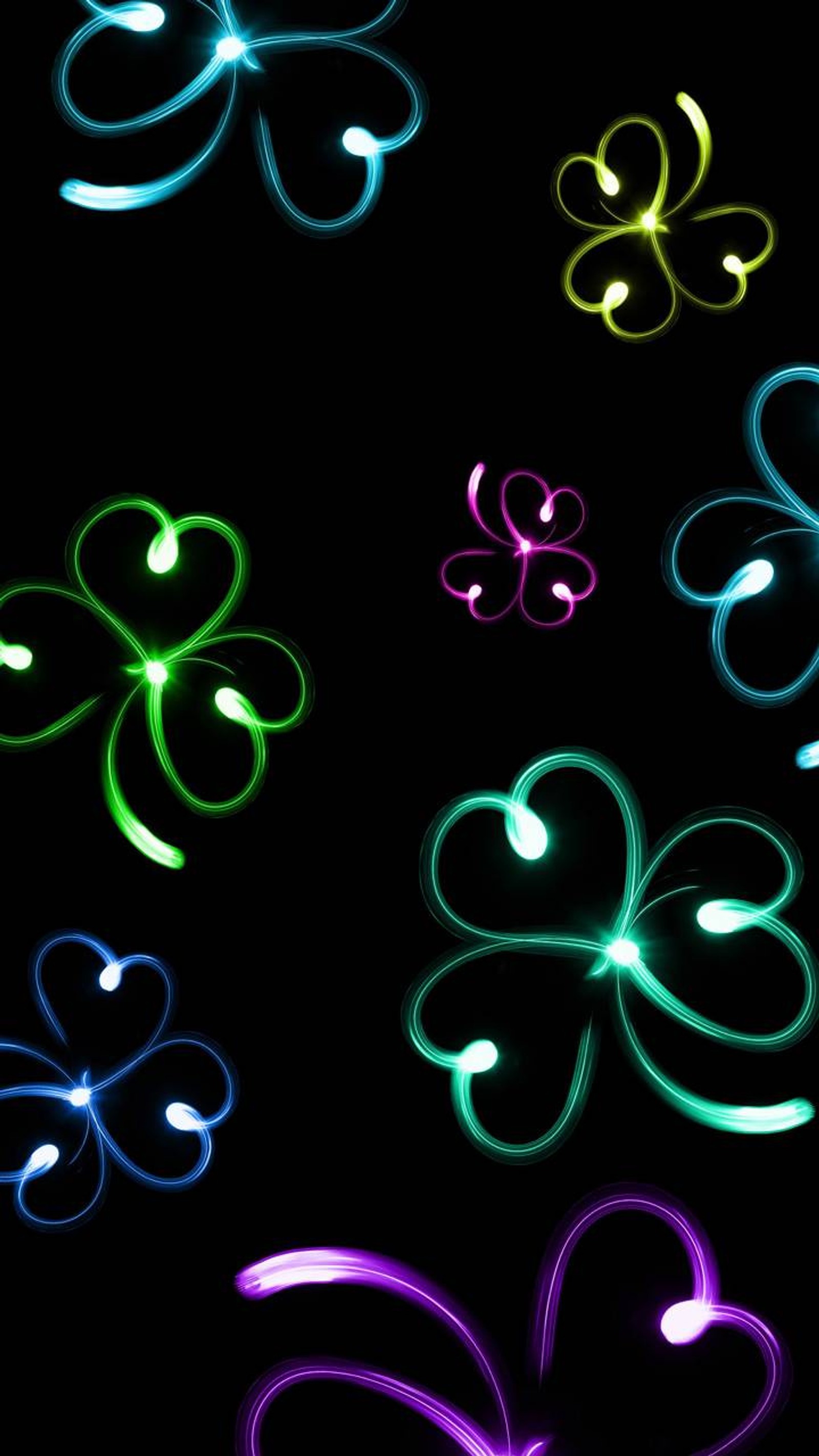 A close up of a bunch of lights that are on a black surface (good, good morning, green, packer)