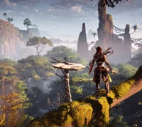 Aloy surveying a vibrant, lush landscape with towering rock formations in "Horizon Zero Dawn.