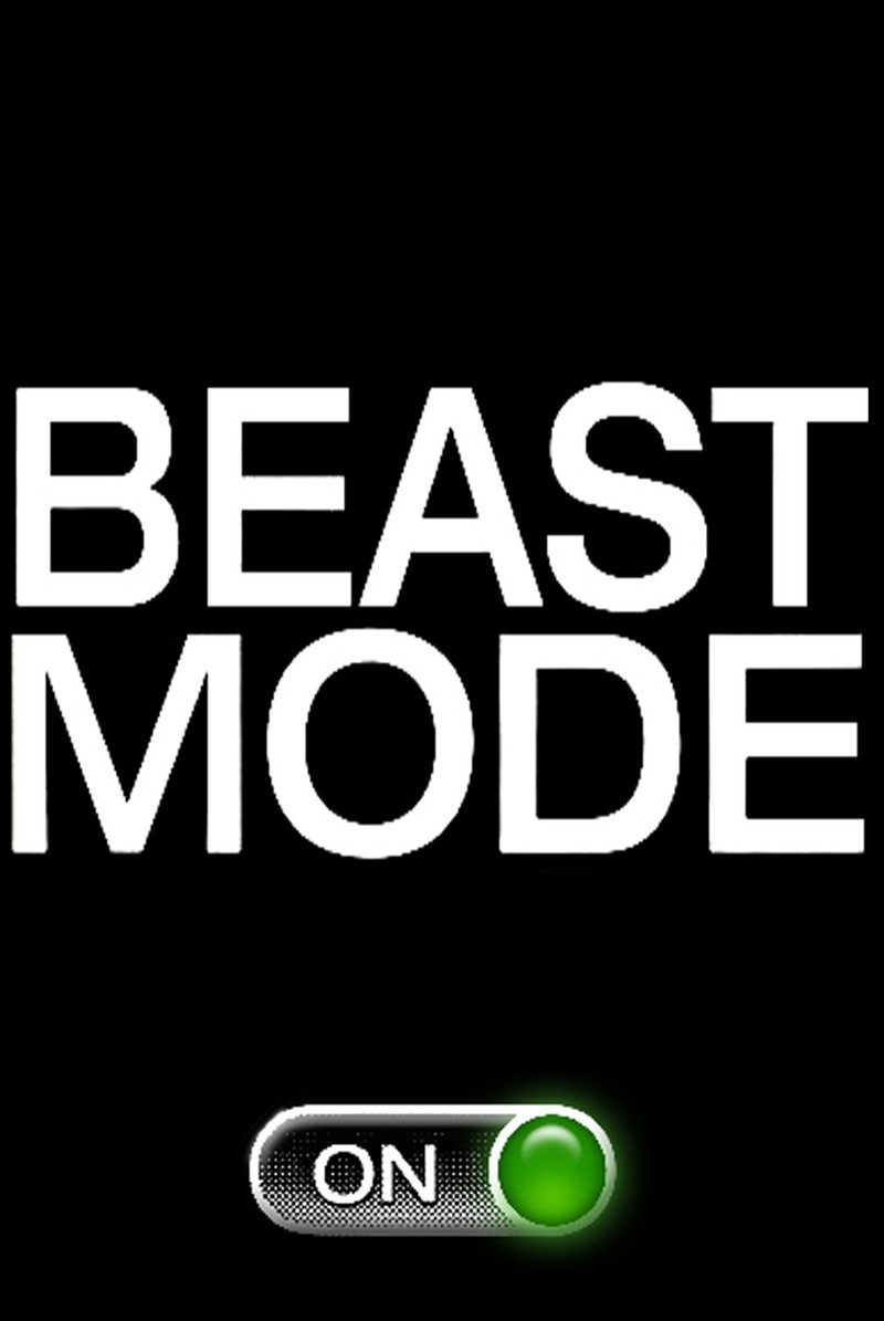 Близкий план кнопки на черном фоне с надписью beast mode (асб, fdx)