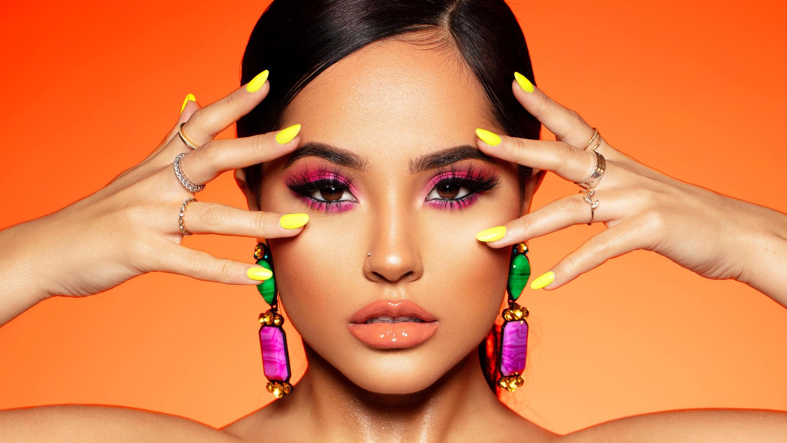 A woman with bright nails and colorful nail polish holding her hands over her face (becky g, singer, celebrity, women, girls)