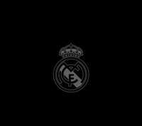 Logo del Club Real Madrid sobre fondo negro