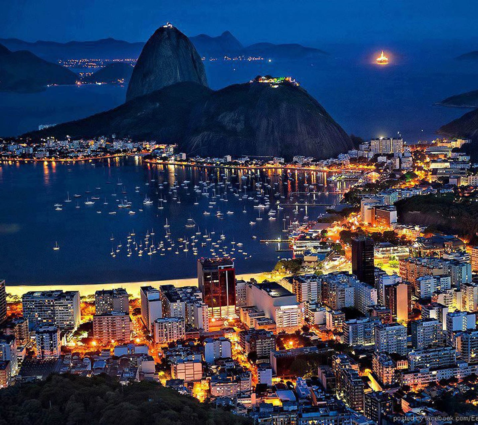 A view of a city with a mountain in the background (beach, brazil, cityscape, island, lights)