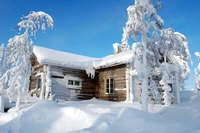 Granja cubierta de nieve en un país de las maravillas invernal