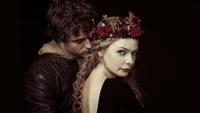 Enchanting Connection: A Dark Romantic Embrace with Floral Headpiece