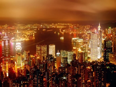 Vibrant Night Skyline of Hong Kong: A Dazzling Urban Metropolis Illuminated by City Lights