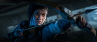 Ellie Williams zielt mit Präzision in The Last of Us