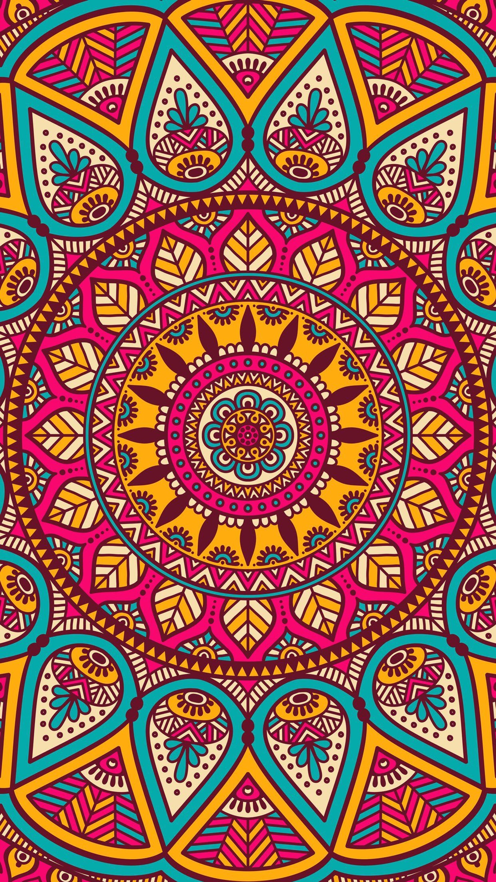 Um padrão circular colorido com uma flor no meio (colorido, mandala, bonito)