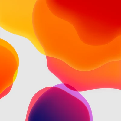 Formes abstraites vibrantes dans des tons chauds inspirées par iOS 13