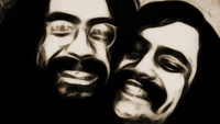 Joyful close-up of two smiling faces with distinct hairstyles and expressive features.