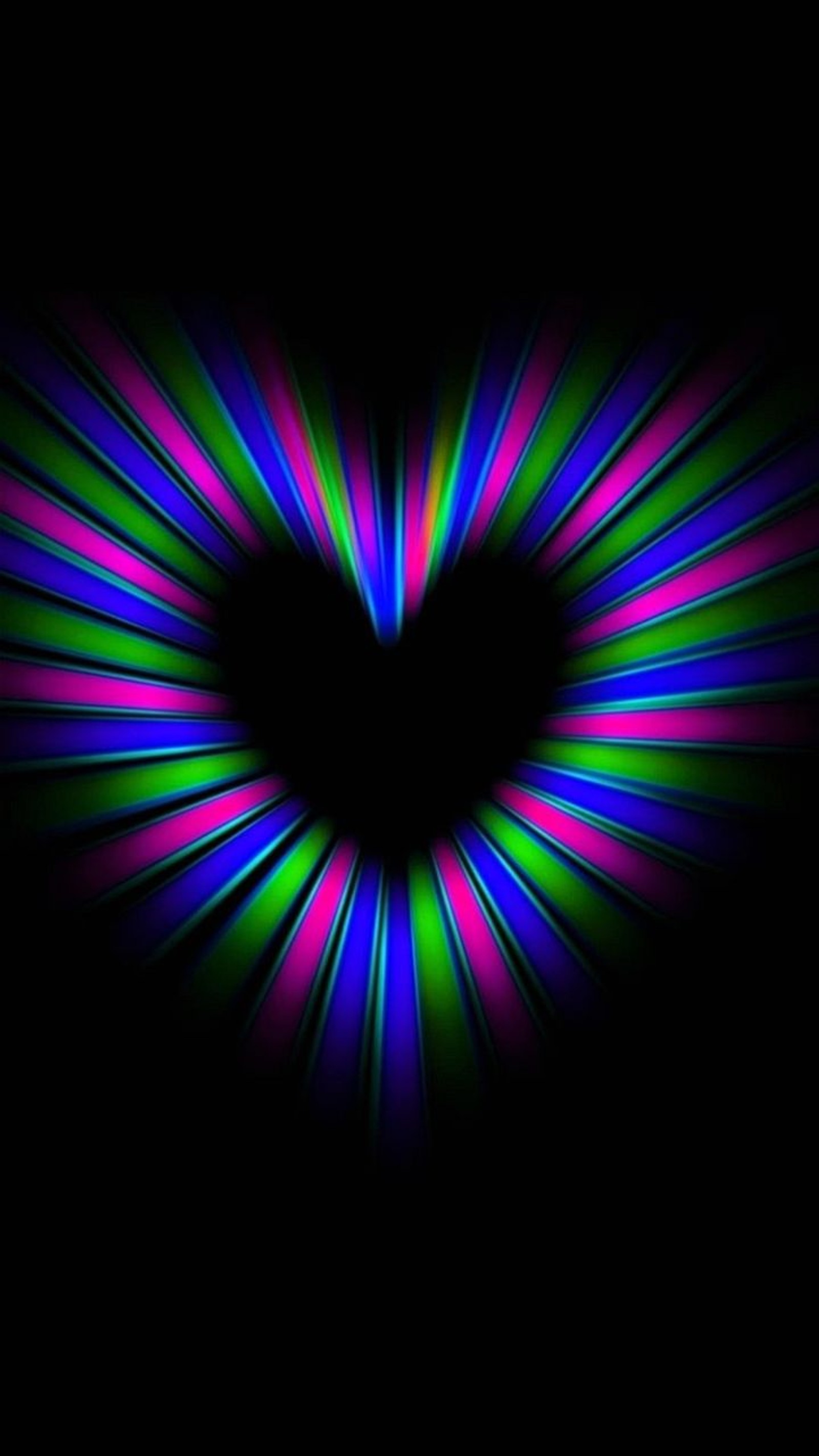 A heart shaped neon light in the dark with a black background (color, heart)