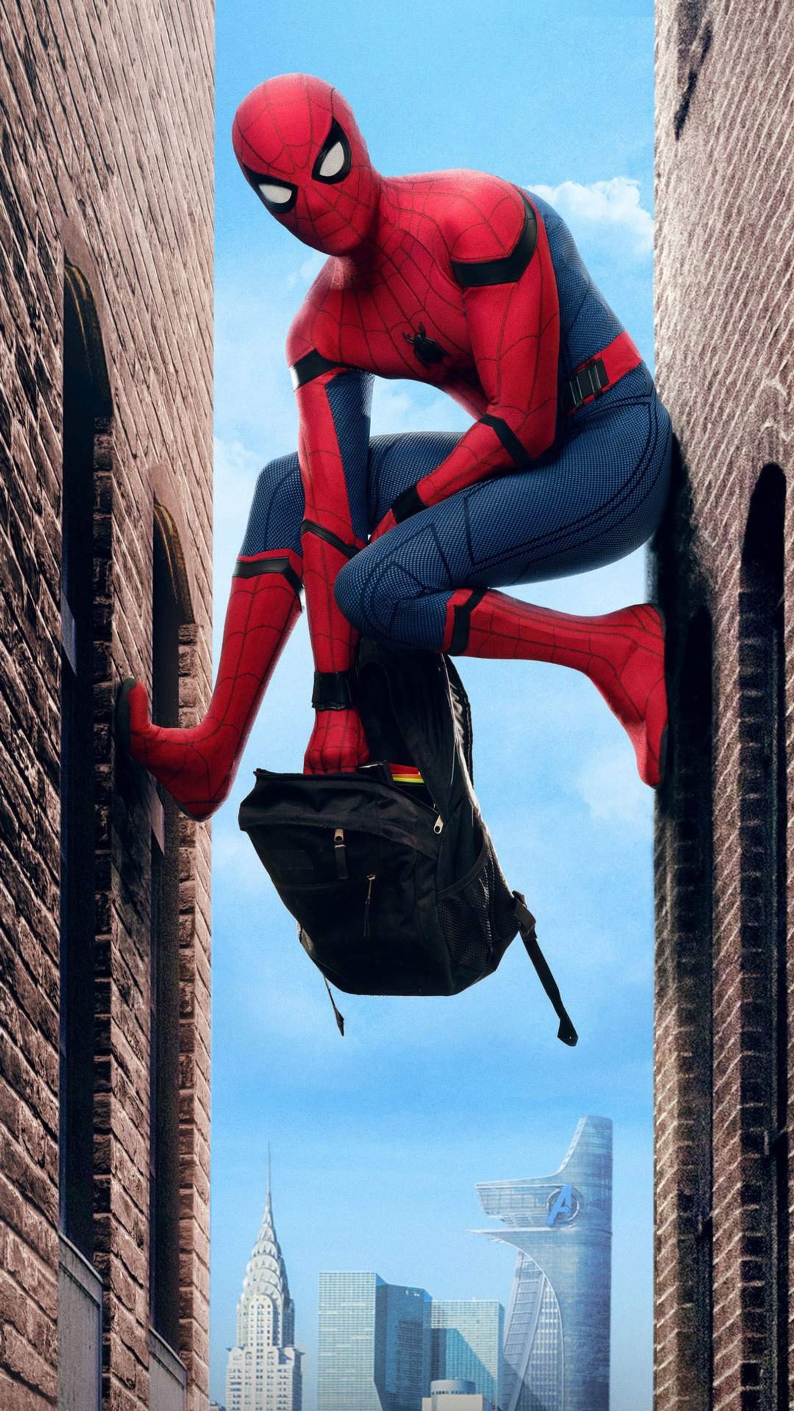 Spider-man suspendu d'un bâtiment dans une ville (spiderman, marvel)