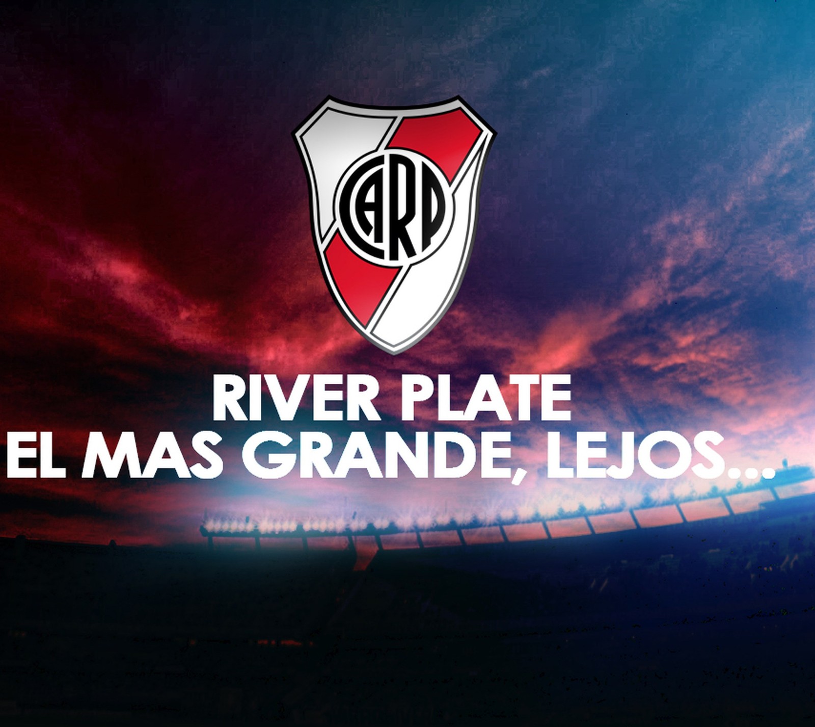 Close-up de um campo de futebol com um céu vermelho ao fundo (argentina, monumental, river plate)