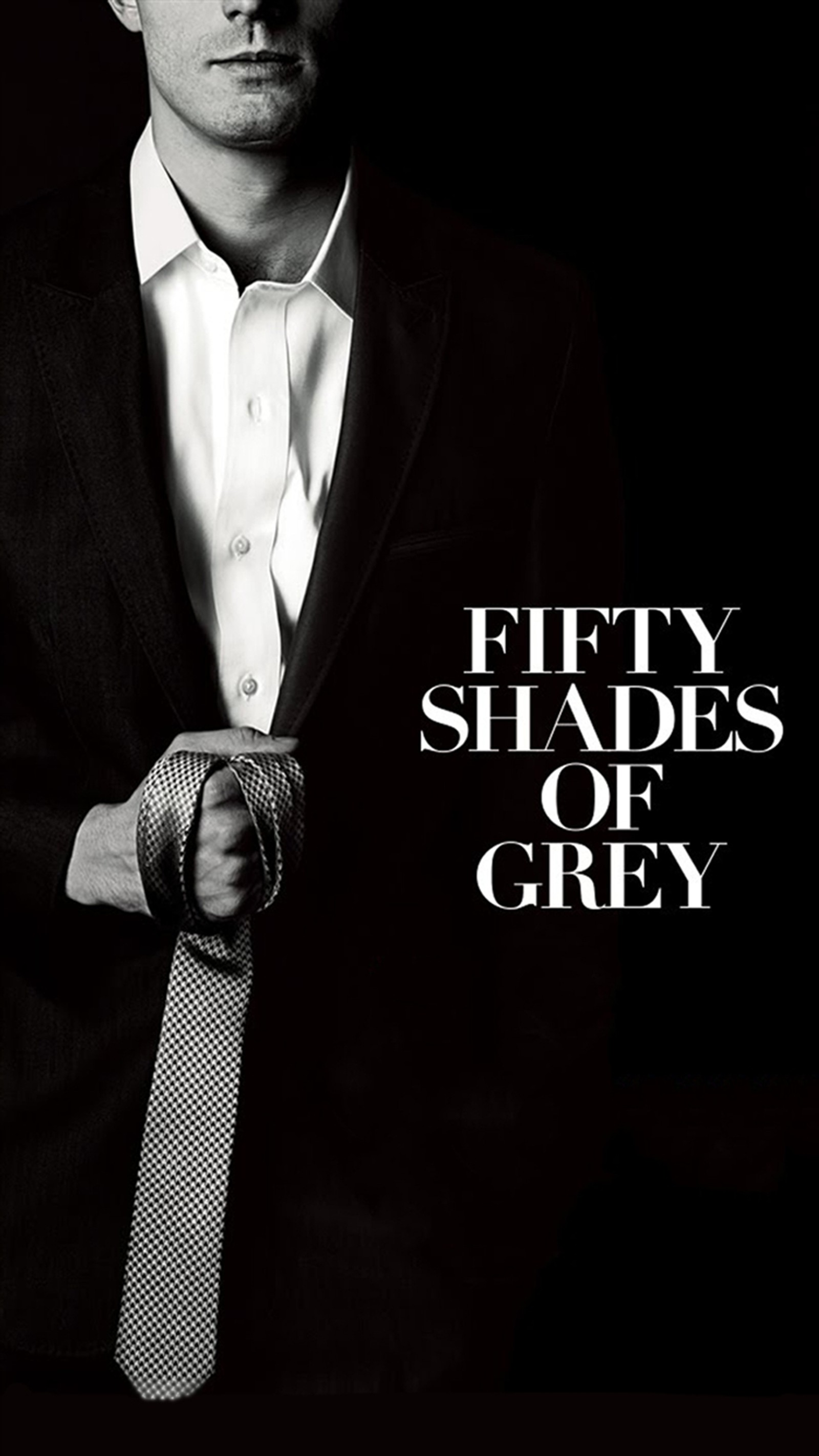 Arafed image of a man in a suit and tie with the words fifty shades of grey (fifty, film, grey, of, shades)