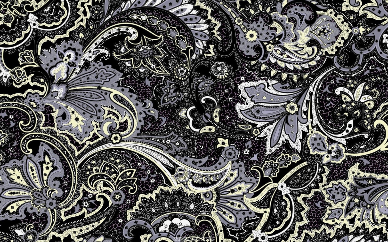 Gros plan d'un motif paisley sur un fond noir (textile, motif, paisley, art, arts visuels)