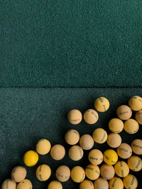 Yellow Tennis Balls on Green Surface