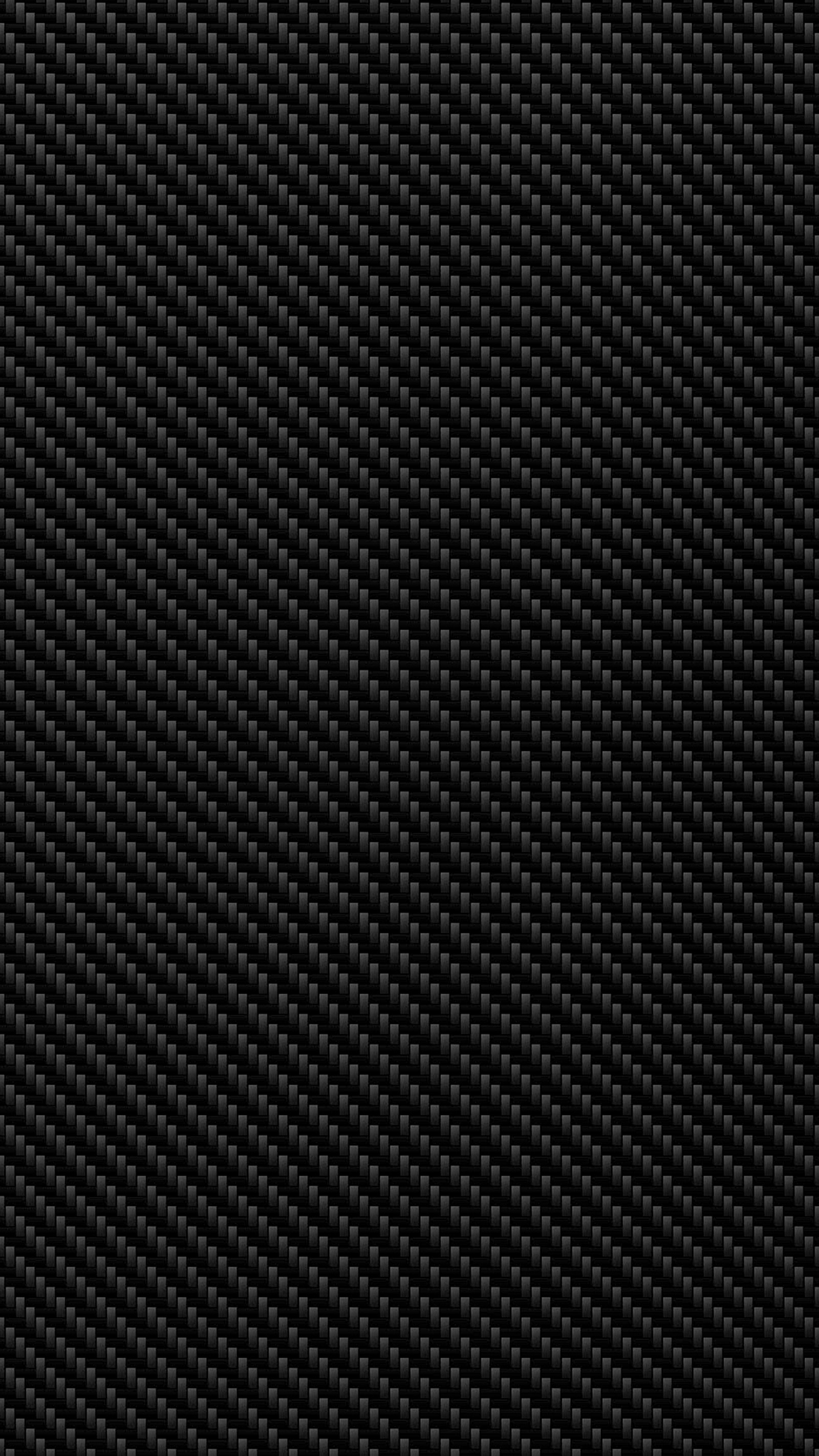 A close up of a black carbon fiber texture (carbon, fiber, fibre, texture)