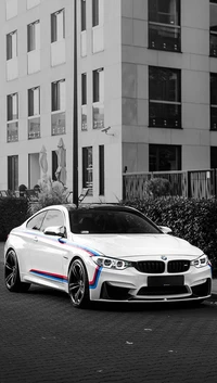 Sleek White BMW on Urban Roadway