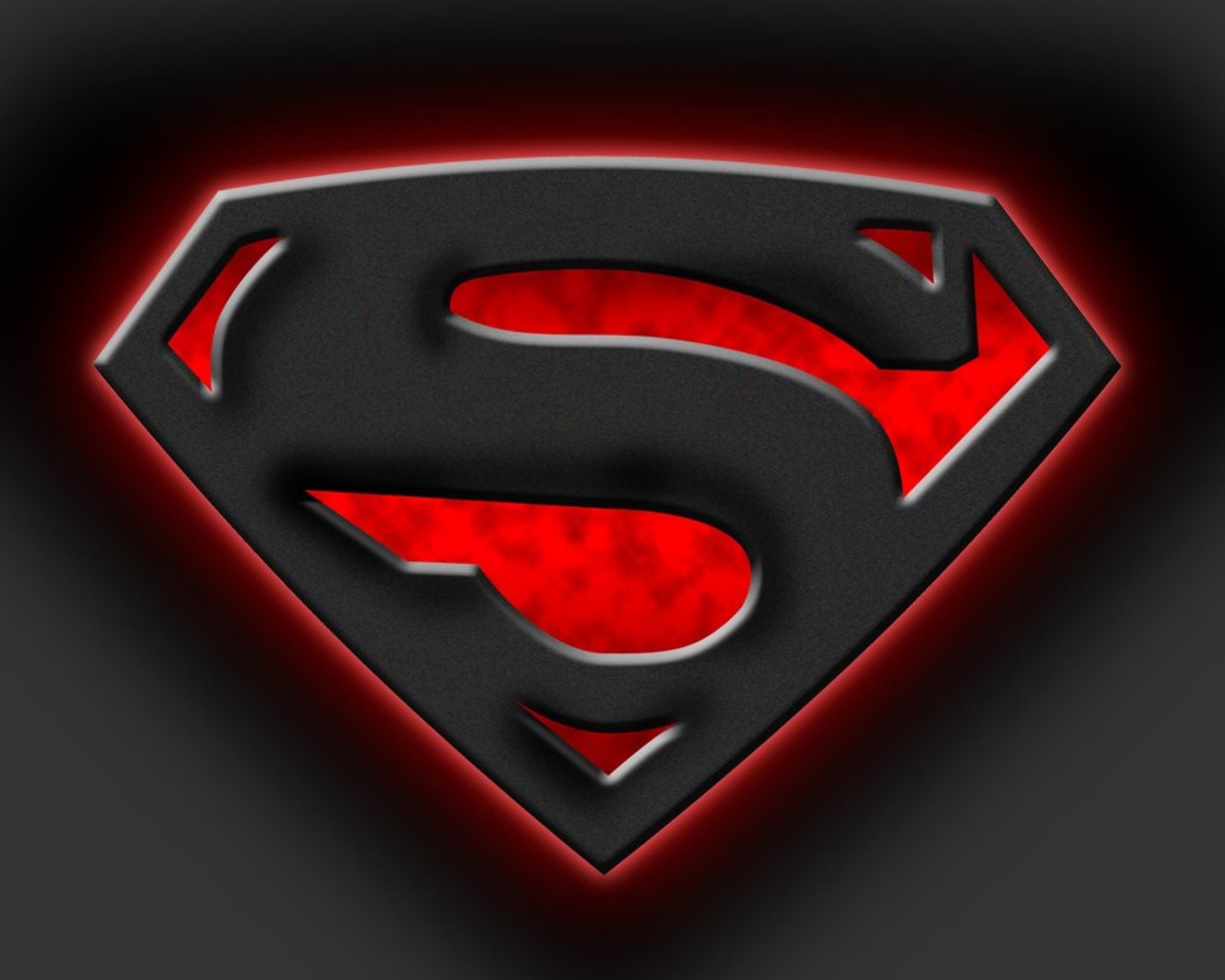 A close up of a superman logo on a black background (logo, superman)