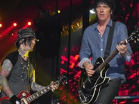 Dynamic Rock Performance by Guns N' Roses Musicians