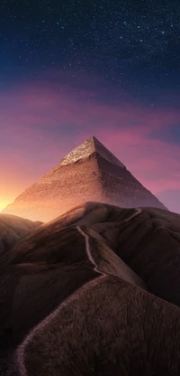 Majestic Pyramid Against a Starry Sky at Dusk