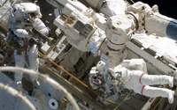 NASA Astronauts Conducting Spacewalk for Hubble Space Telescope Maintenance