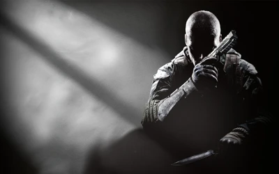 A shadowy figure in tactical gear holds a handgun, shrouded in darkness with a sense of tension and anticipation.